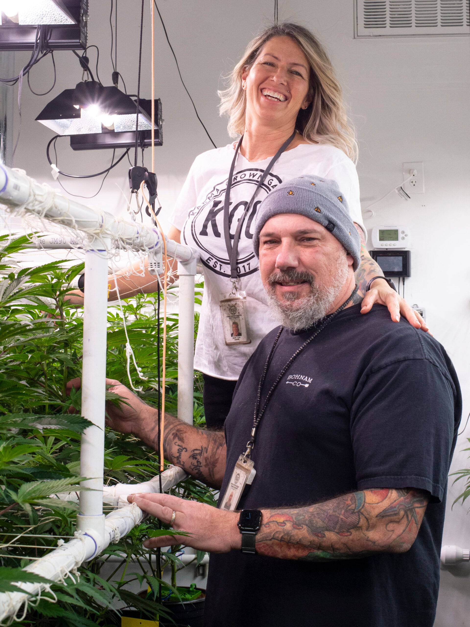 Karma Grown Gardens owners Tom and Stacy Holohan tend to their plants.