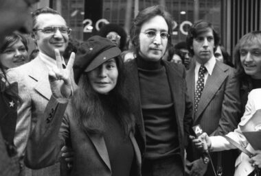 John Lennon & Yoko Ono with lawyer Leon Wiles.